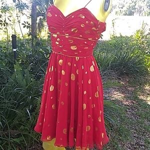 Vintage red hot pin-up dress with gold polka dots